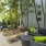 a patio with chairs and tables
