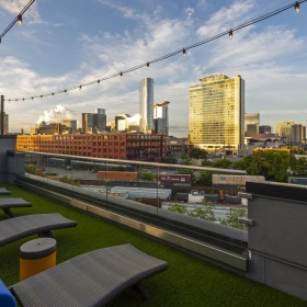 Settle into comfort at Infinity Lofts in the Gulch chairs and tables on a balcony