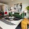 a living room with a couch and chairs