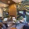 a living room with a large mural