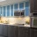 a kitchen with blue cabinets