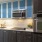 a kitchen with blue cabinets