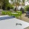 a table with chairs and tables outside